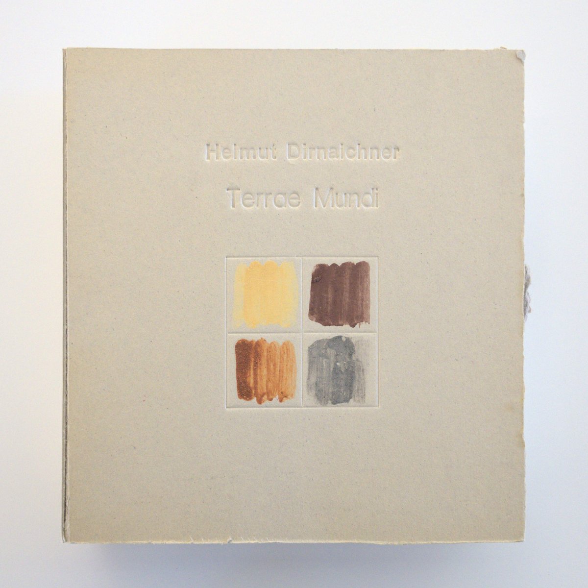 book front cover view: helmut dirnaichner, &quot;terrae mundi&quot; (2002), cardboard, 23 x 23 cm