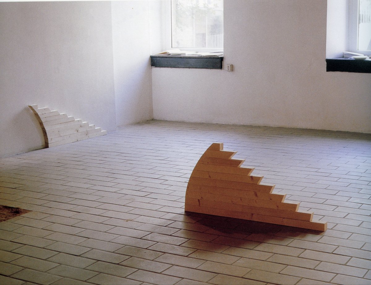view of installation: &quot;twisting + turning&quot; (1989), wood, 90 x 45 x 45 cm